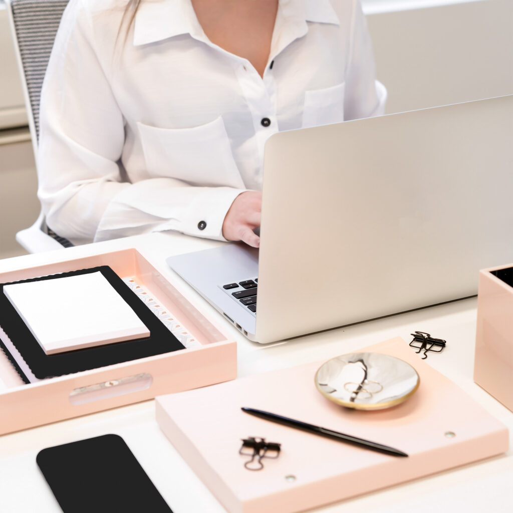Person working at desk on laptop