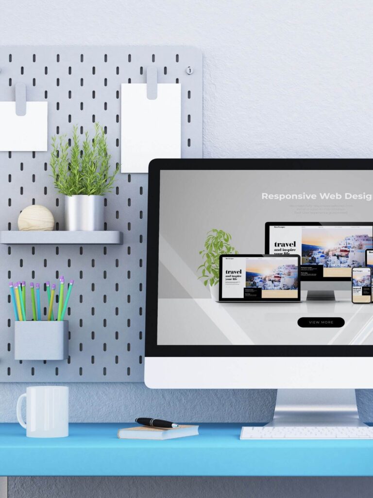 Photo showing desktop tablet and mobile responsive website